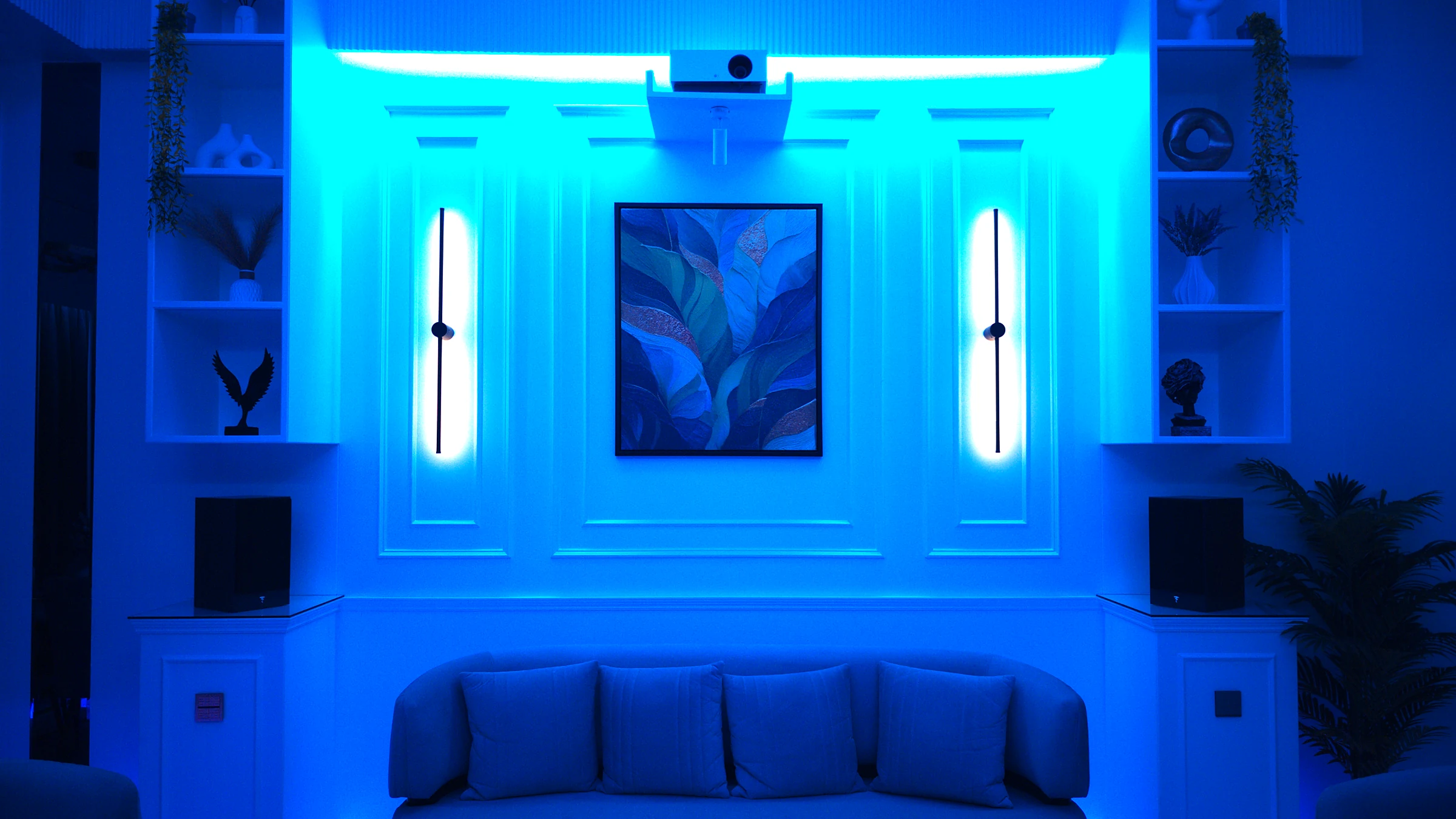The same wall under blue and violet colour light across coves and plinths